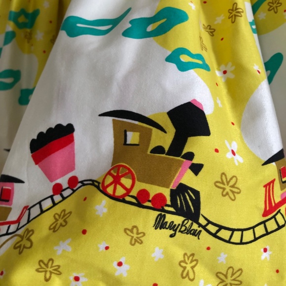 Pinup Couture Jenny Skirt in Mary Blair "Bon Voyage" Yellow Train Print, Small - Picture 4 of 10